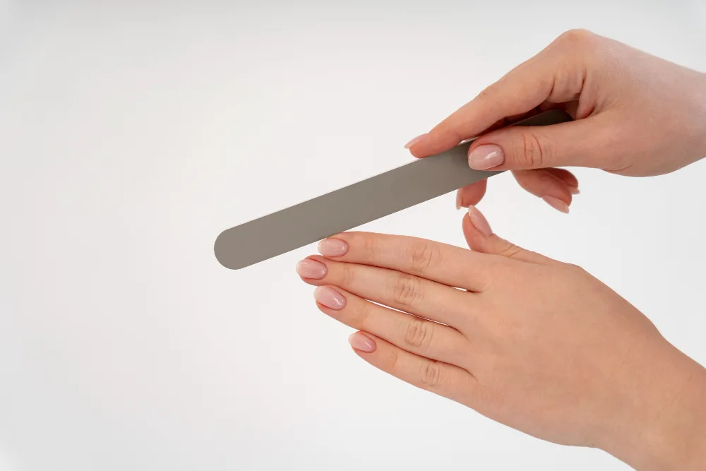 Image of Cuticle Pusher in hands